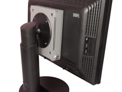Mac Mini security enclosure VESA-mounted behind a monitor